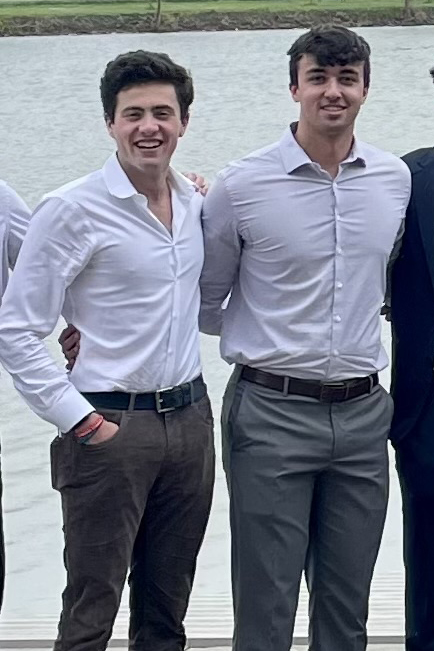 Nicholas Colaw at the Lightweight Rowing Banquet with his roommate Dylan