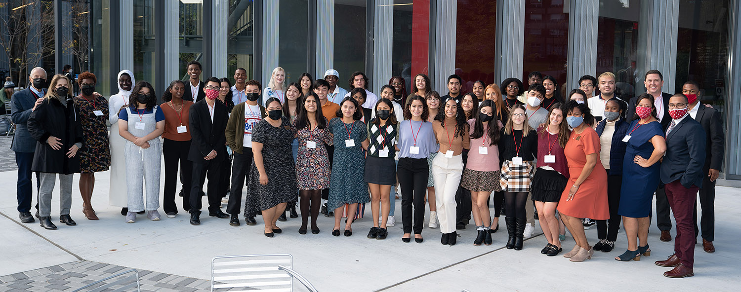 Kessler Scholars gather outside of Toni Morrison Hall at coin presentation event with Fred Wilpon