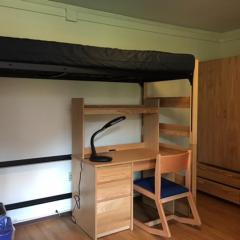 Lofted bed with a desk underneath