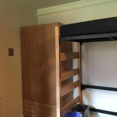 View of Closet and lofted bed.